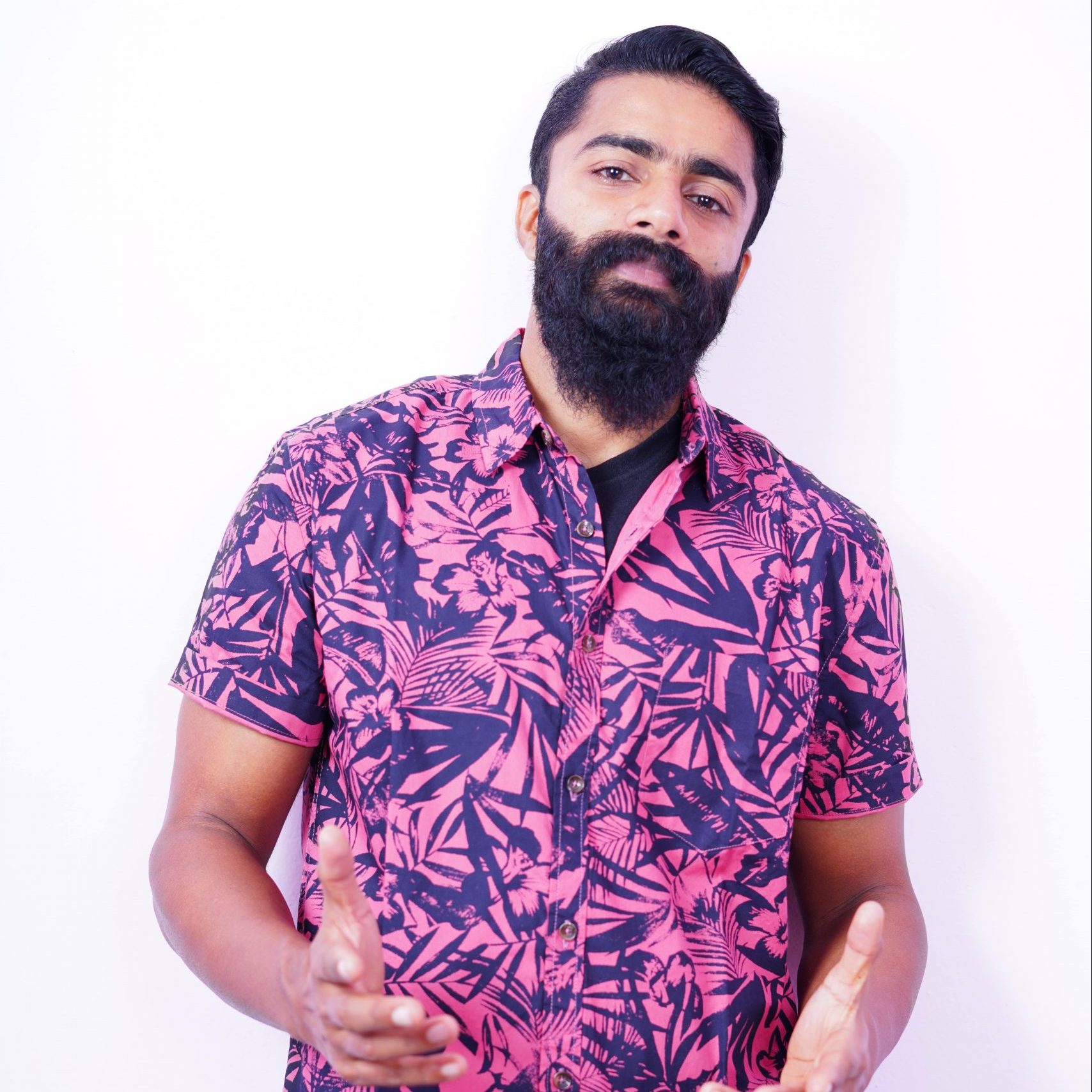  Bearded Man in Printed Shirt